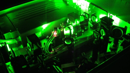 This is what a high-powered scientific laser looks like! The box in the upper left corner is where the laserlight comes from, and the rest of those things are mirrors to tweak the light to be just how we like it.