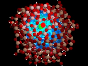 An atomic-level representation of a coated nanoparticle. The blue on the inside is the core of the nanoparticle and the red spheres are the protective coating. Image source.