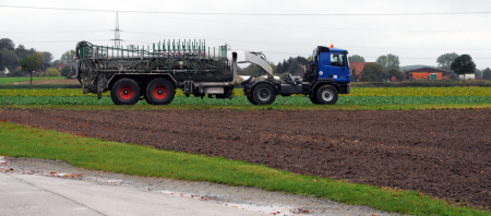 A sewage sludge application truck. Many cities offer the application of this sludge to fields as a free service.